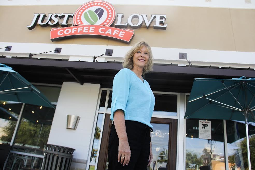 Just Love Coffee franchise owner in front of her Destin location